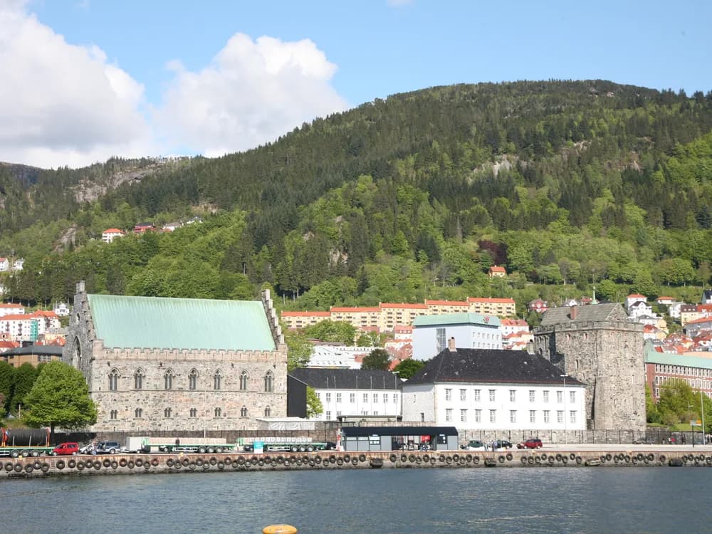 Bergenhus Fortress Håkon's Hall and Rosenkrantz Tower above Bergen harbour with Bryggen visible beyond, Norway