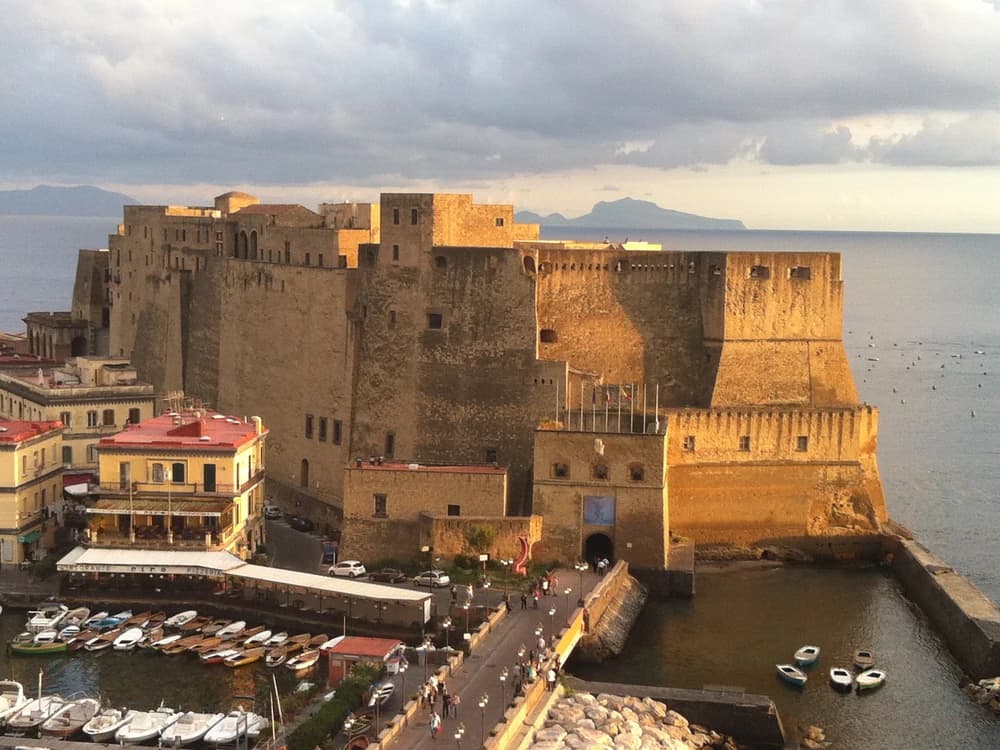 Castel dell'Ovo rising from the Bay of Naples with Vesuvius in the background