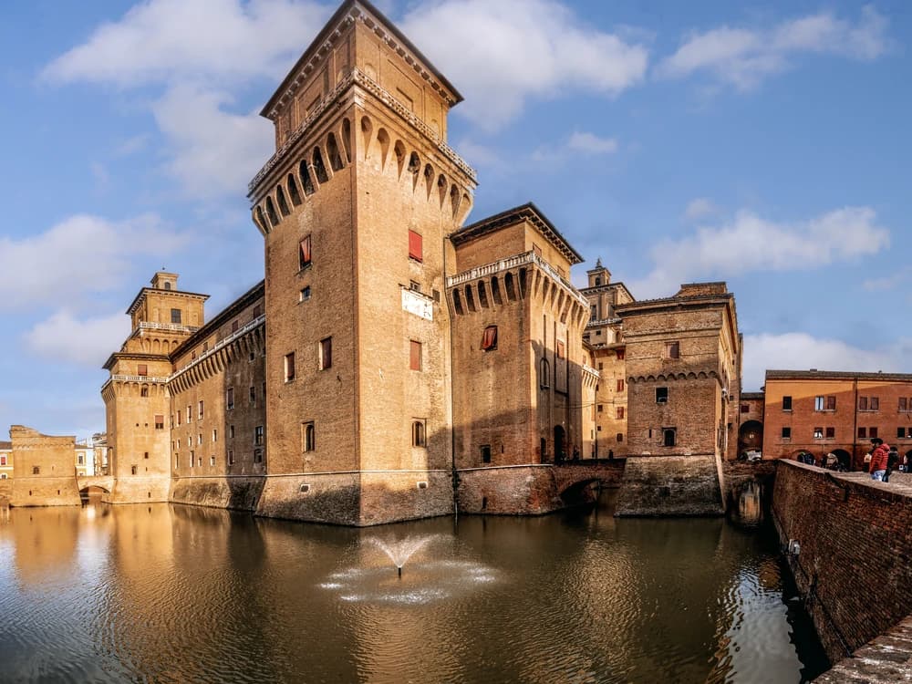Castello Estense rising from its moat in the centre of Ferrara, Italy