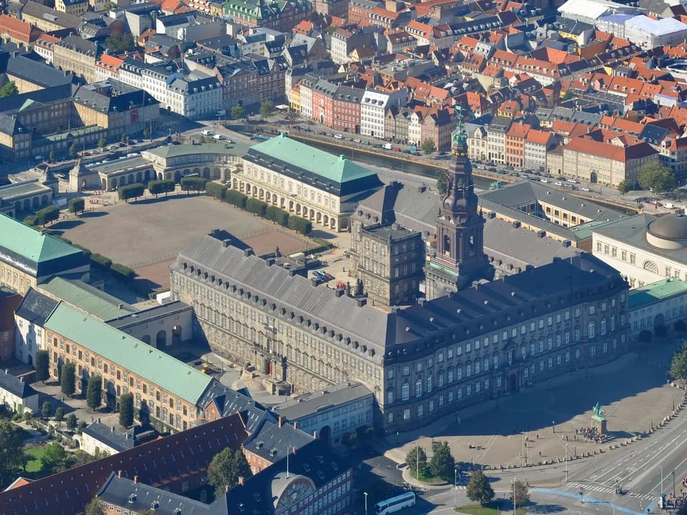 Christiansborg Palace's Neo-Baroque tower rising above Slotsholmen island in Copenhagen