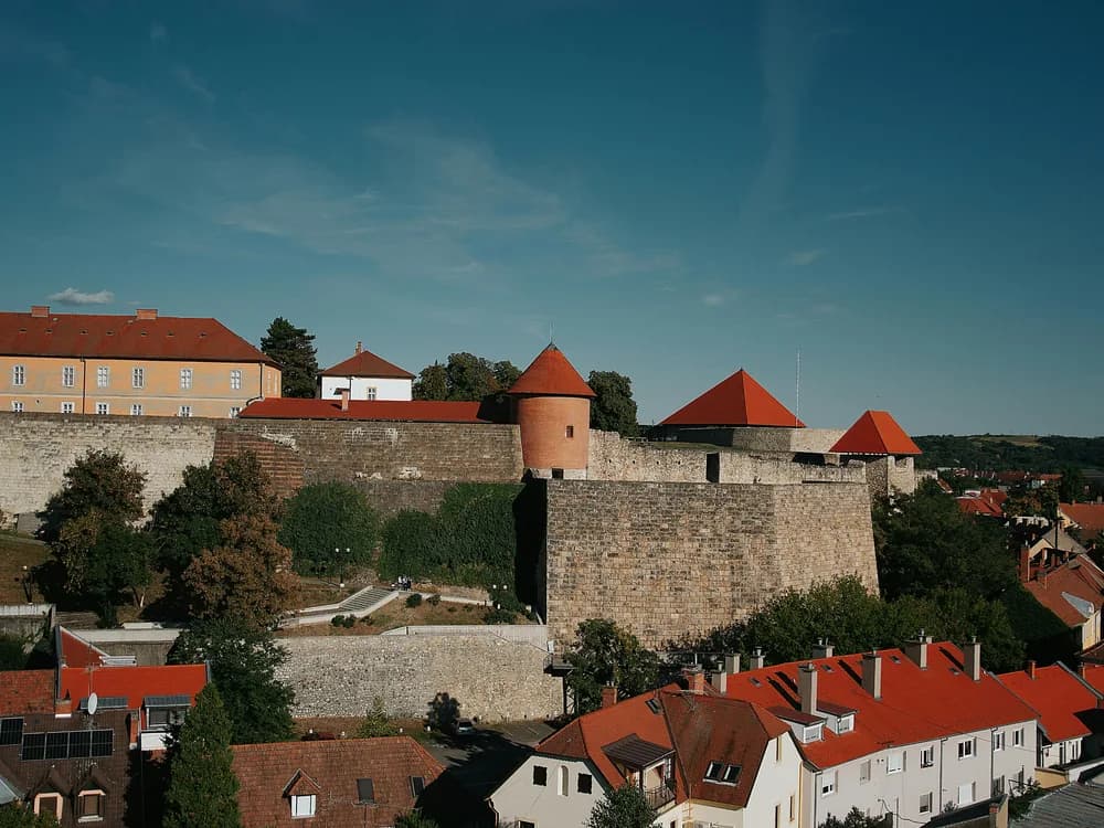 Eger Castle on its hill above the Baroque city, with the Eger Valley visible beyond
