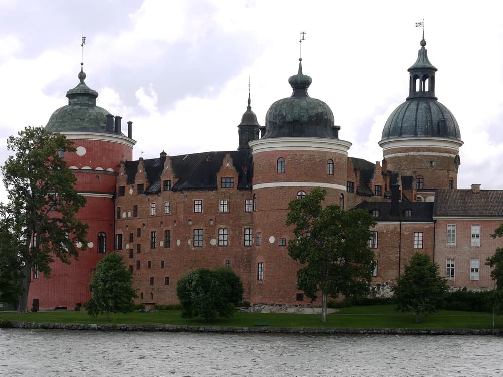 Gripsholm Castle's round towers reflected in Lake Mälaren, Mariefred, Sweden