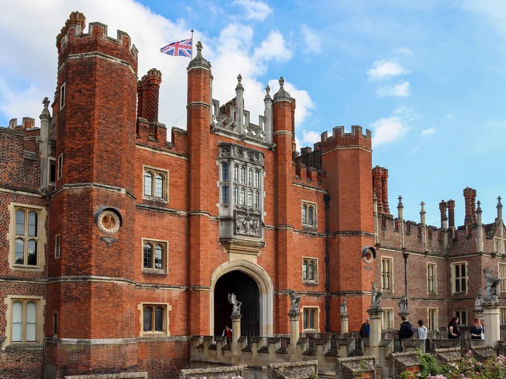 Hampton Court Palace's Tudor gatehouse and Baroque wings beside the Thames, Greater London