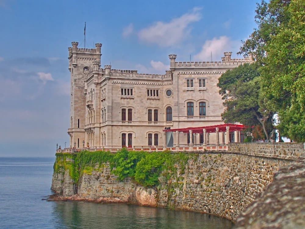 Miramare Castle rising from the Adriatic Sea cliffs near Trieste, Italy