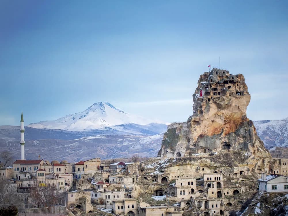 Ortahisar Castle rock needle rising above the Cappadocian village in Turkey
