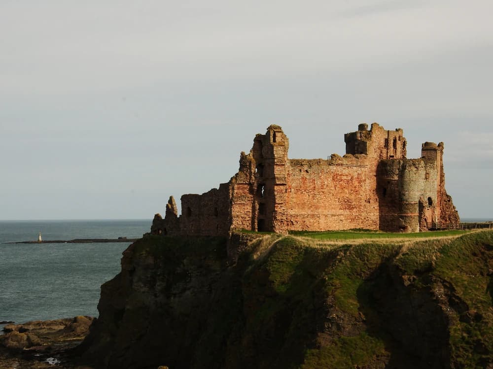 Tantallon Castle red sandstone ruins on sea cliffs above the North Sea, East Lothian, Scotland