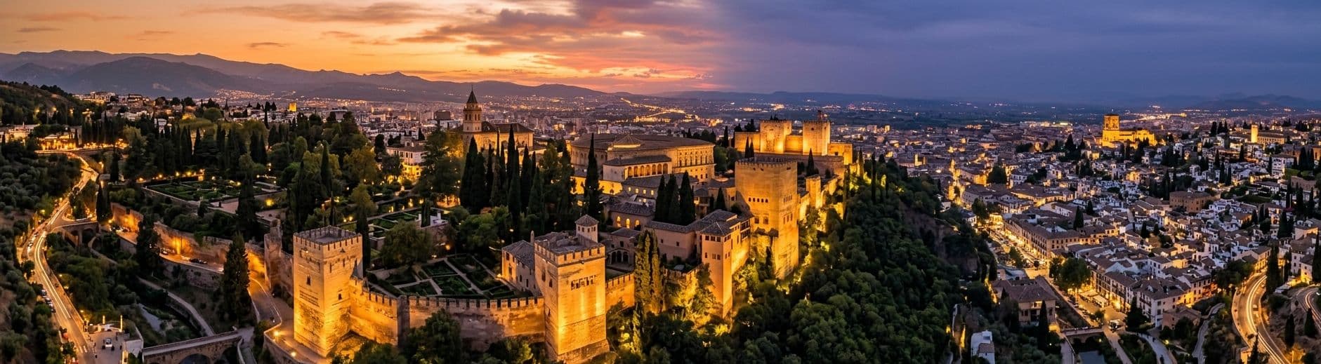 The Alhambra palace complex overlooking Granada at golden hour