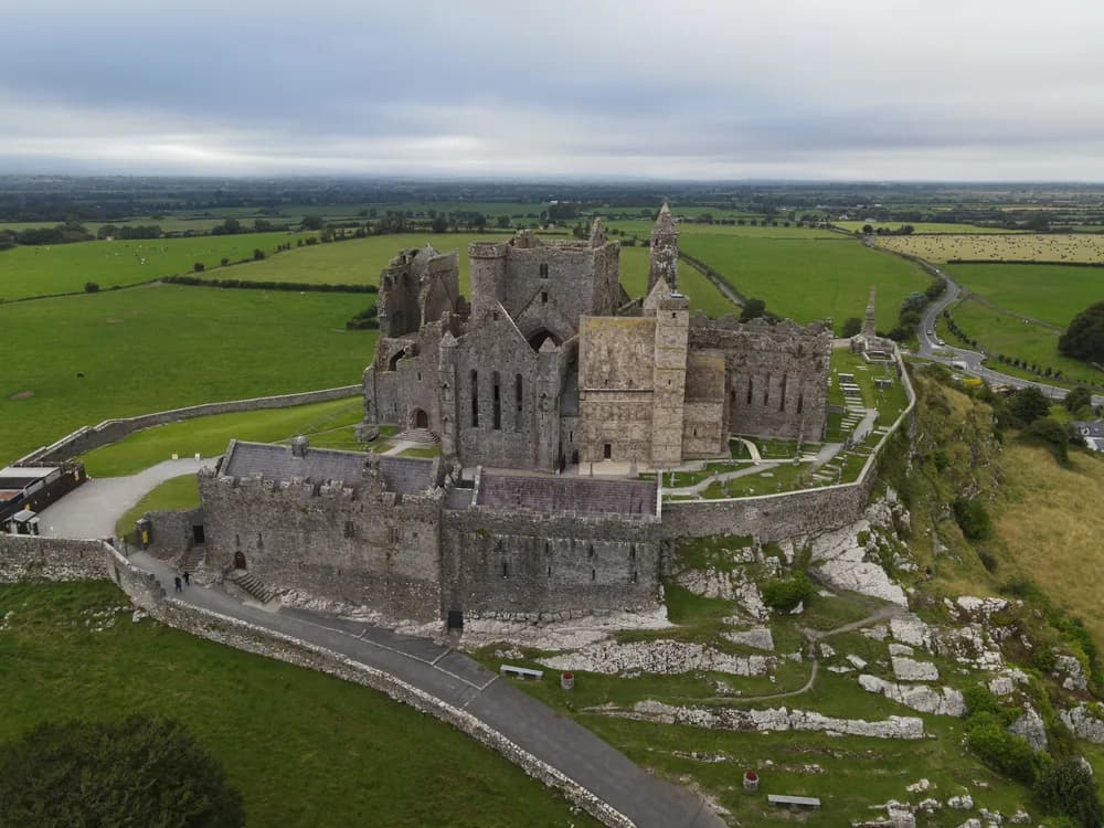 The Rock of Cashel rising dramatically from the Tipperary plain at sunset