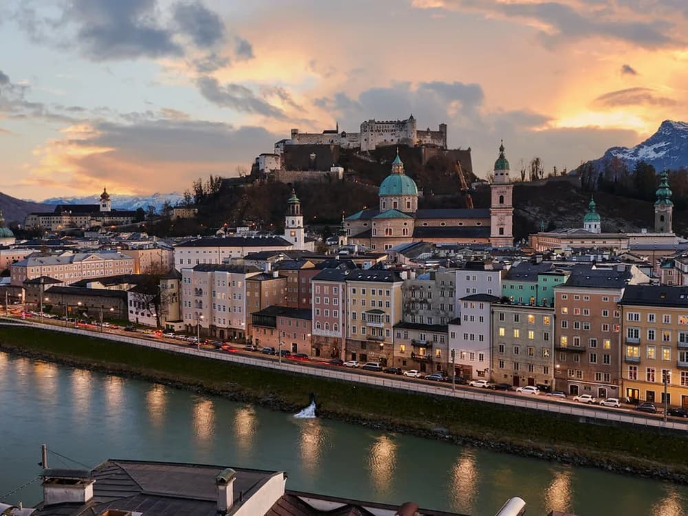 Hohensalzburg Fortress rising above Salzburg's baroque skyline and the Salzach river
