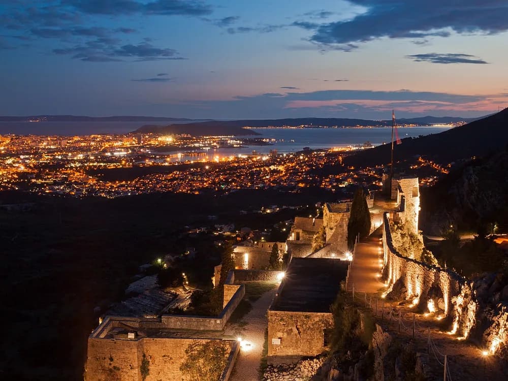 Klis Fortress on its limestone ridge above Split and the Adriatic coast, Croatia