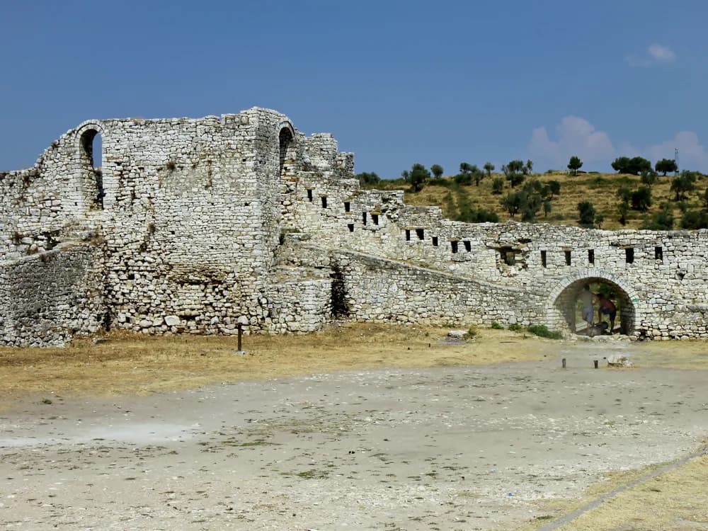 Berat Castle rising above the white-windowed houses of the UNESCO city in Albania
