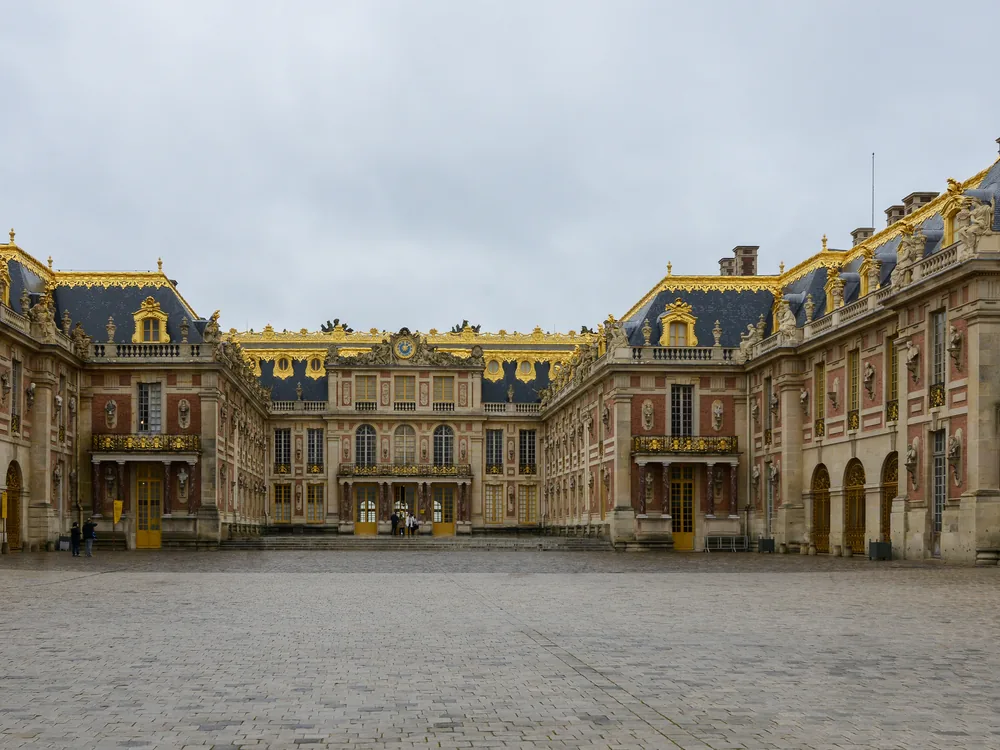 The Hall of Mirrors at the Palace of Versailles, with gilded arches and chandeliers reflected in 357 mirrors